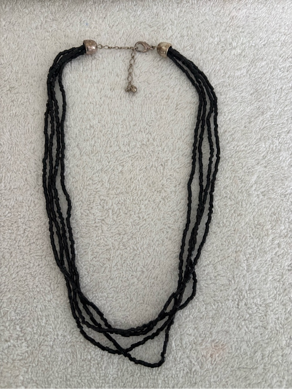 Black and silver toned beaded multi strand necklace